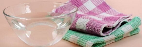 navlaženi ručnik za kompresiju za cervikalnu osteohondrozu